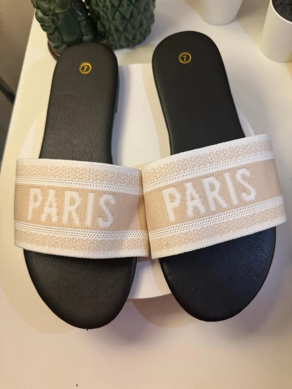 Women's Paris slide sandals with beige embroidered jacquard strap and black cushioned footbed