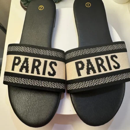 Women's Paris slide sandals with black embroidered jacquard strap and black cushioned footbed