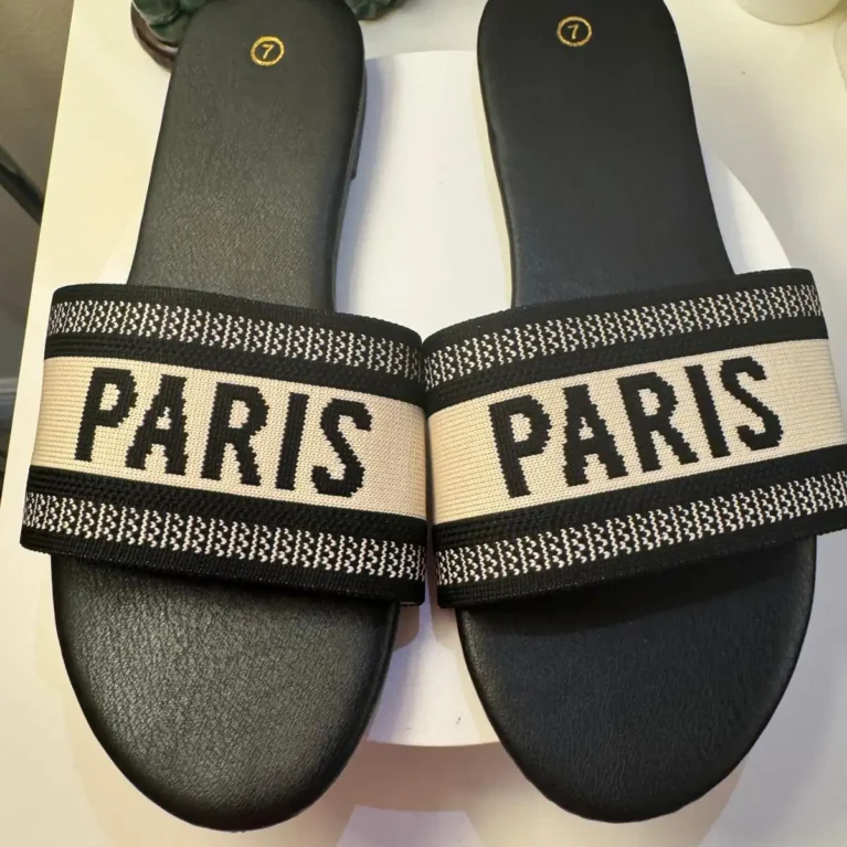 Women's Paris slide sandals with black embroidered jacquard strap and black cushioned footbed