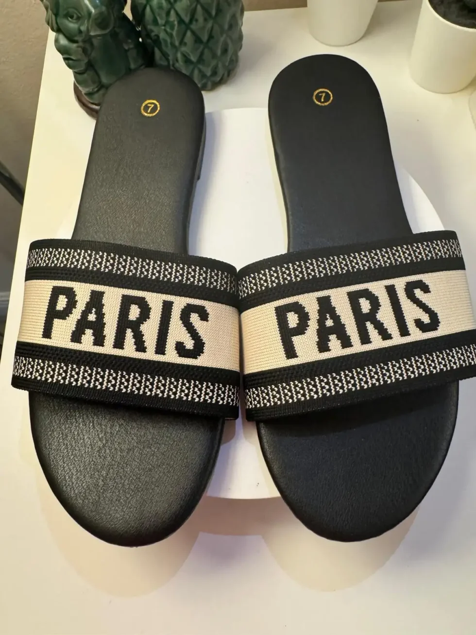 Women's Paris slide sandals with black embroidered jacquard strap and black cushioned footbed