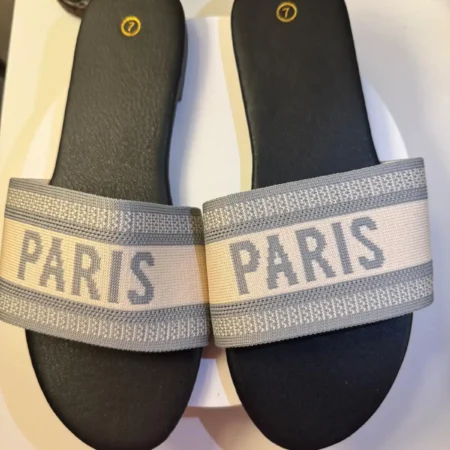 Women's Paris slide sandals with grey and cream embroidered jacquard strap and black cushioned footbed